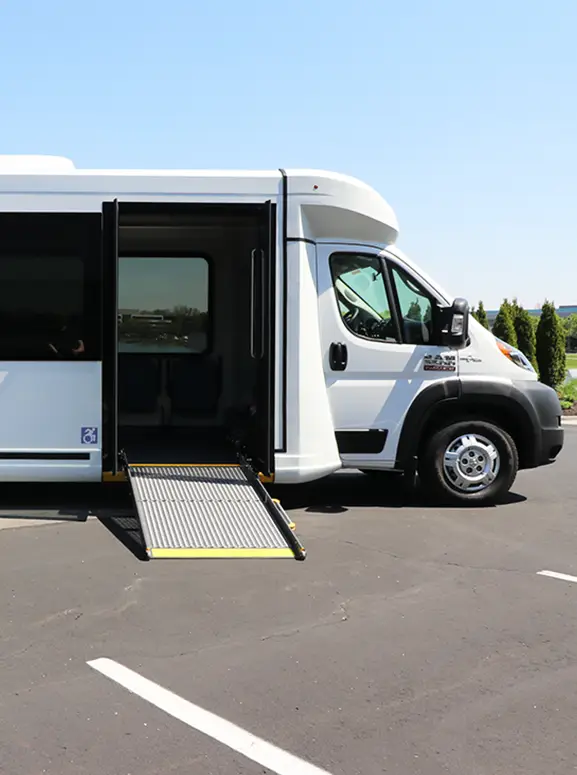 Handicap accessible vehicles in Denver white wheelchair accessible bus